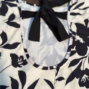 Chic Black and White Floral Top with Bow